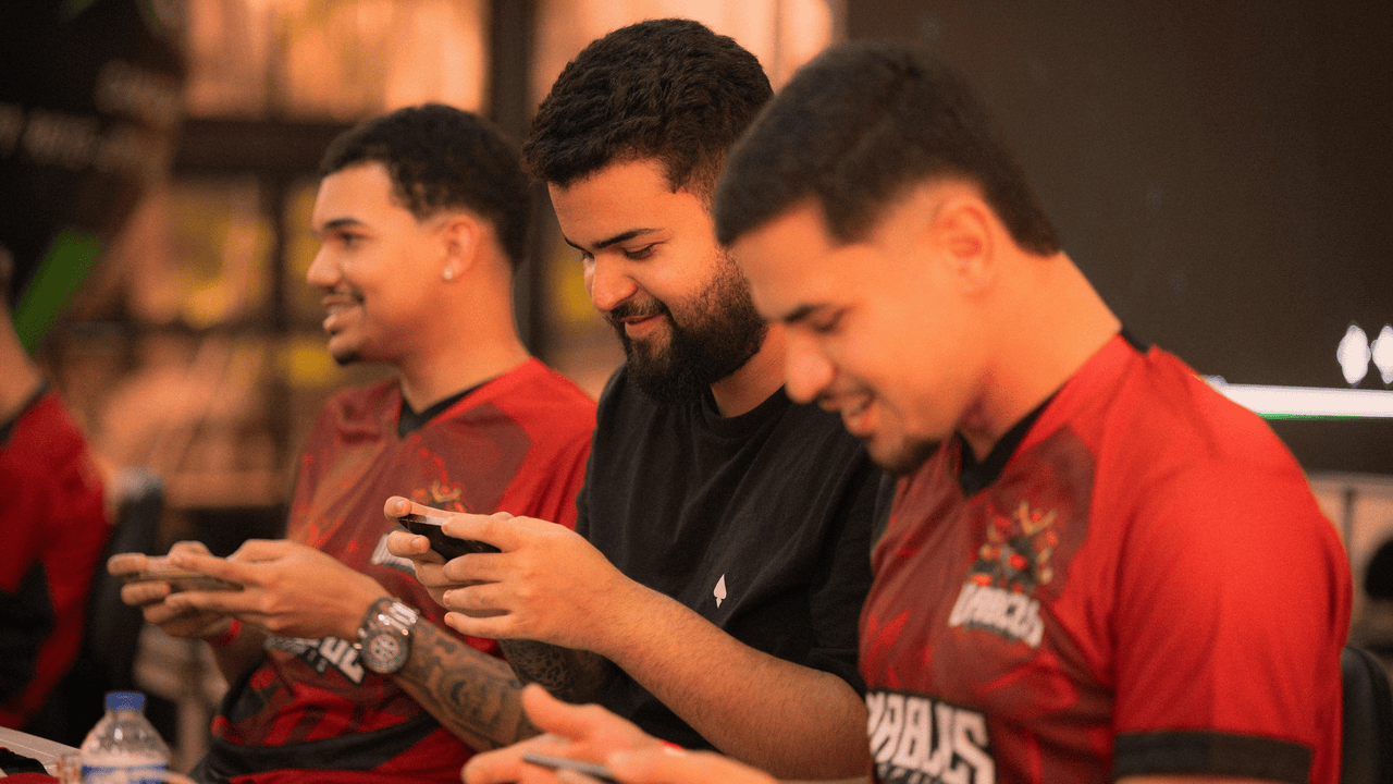 Three men playing multiplayer games together