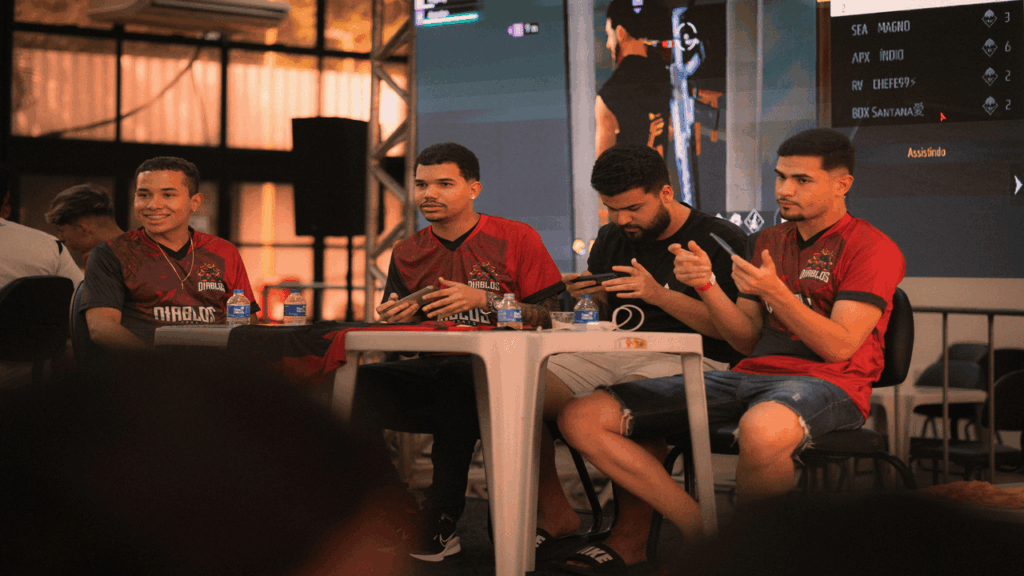 Three men playing multiplayer games together